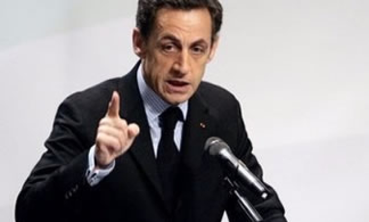 As anger rises over journalist's arrest and humiliation, Sarkozy talks of changing libel laws