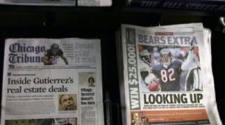 Acute ad crunch, $13 bn debt force newspaper giant Tribune Co to file for bankruptcy