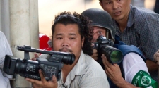 Journalists playing with death while shooting political unrest in Thailand